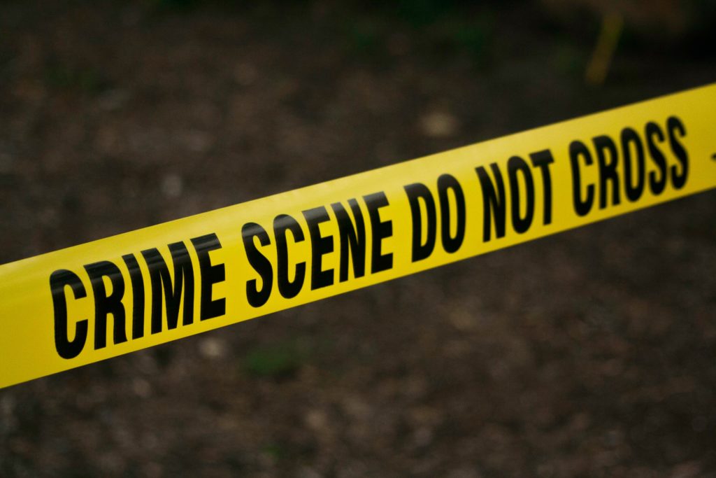 crime scene tape yellow black letters first time offender